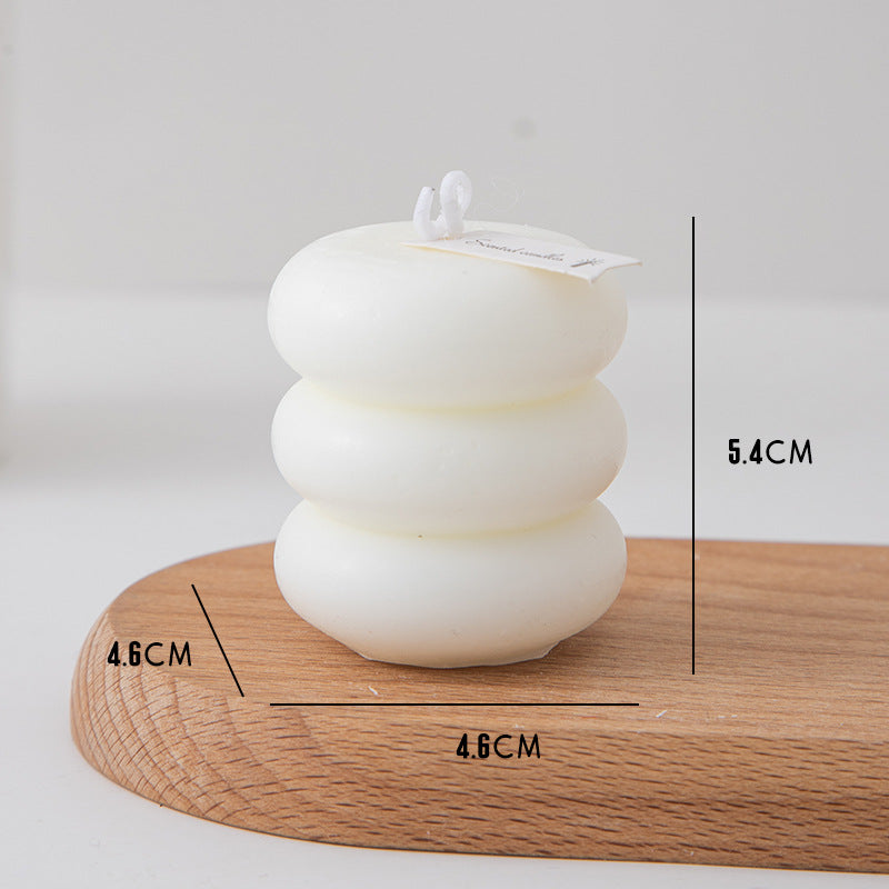 Elegancia abstracta: Velas con formas únicas y creativas Vela con aromas geométricos Triple espiral blanca 